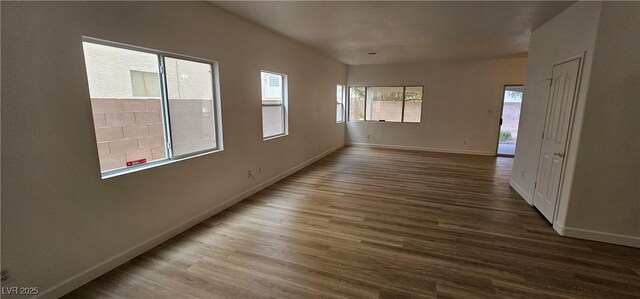 3750 Morning Canyon St, Las Vegas, NV 89147 - spare room featuring baseboards and wood finished floors