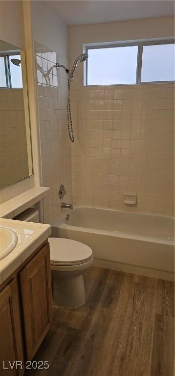 3750 Morning Canyon St, Las Vegas, NV 89147 - bathroom featuring wood finished floors, bathtub / shower combination, toilet, and vanity