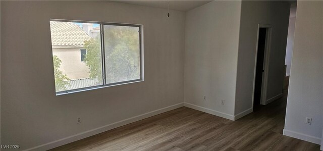 3750 Morning Canyon St, Las Vegas, NV 89147 - empty room with baseboards and wood finished floors