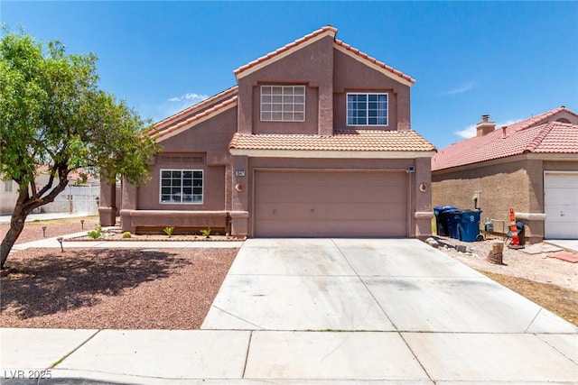 3547 Empress Diamond Dr, North Las Vegas, NV 89032 - view of front of property with stucco siding, a tiled roof, concrete driveway, and a garage