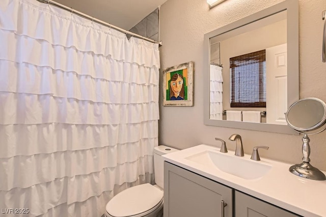 445 Concord Way, Henderson, NV 89015 - full bath featuring toilet, vanity, a textured wall, and curtained shower