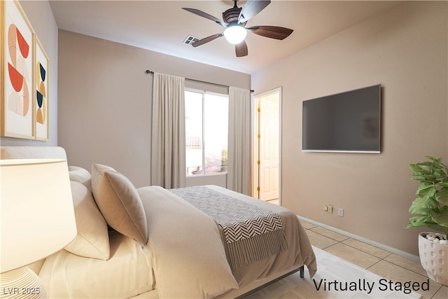 5210 Villa Dante Ave, Las Vegas, NV 89141 - bedroom featuring light tile patterned floors, baseboards, and ceiling fan