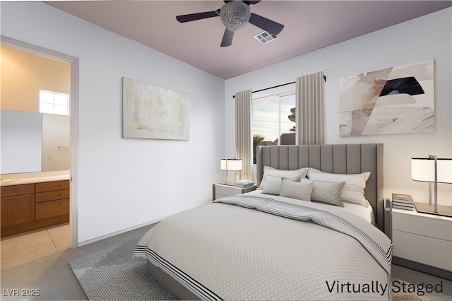5210 Villa Dante Ave, Las Vegas, NV 89141 - bedroom with connected bathroom, a ceiling fan, and light carpet