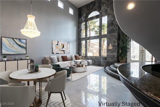 5210 Villa Dante Ave, Las Vegas, NV 89141 - dining space with plenty of natural light, a high ceiling, and a chandelier