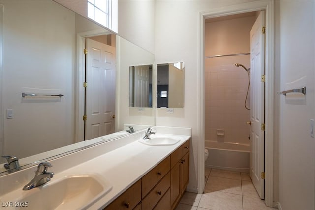 5210 Villa Dante Ave, Las Vegas, NV 89141 - full bathroom featuring toilet, tile patterned floors, double vanity, and bathing tub / shower combination