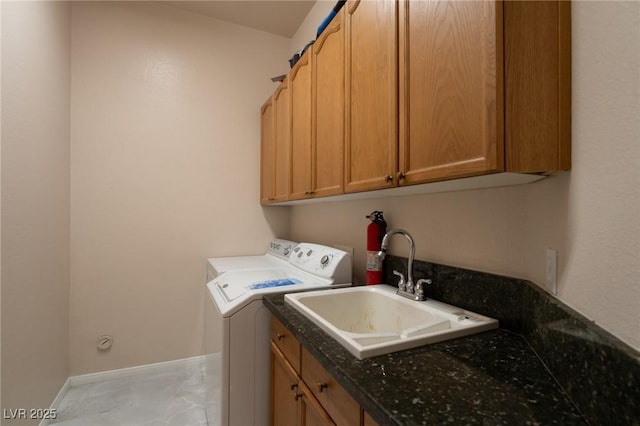 5210 Villa Dante Ave, Las Vegas, NV 89141 - laundry room featuring cabinet space, separate washer and dryer, baseboards, and light marble finish floors