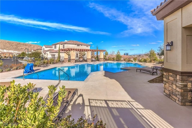 3213 Molinos Dr, Las Vegas, NV 89141 - community pool with a pergola and a patio