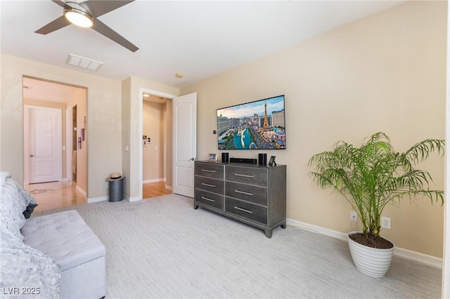 7567 Desertscape Ave, Las Vegas, NV 89178 - living room with ceiling fan, baseboards, and light carpet