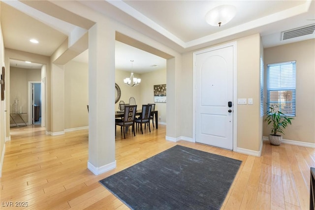 7567 Desertscape Ave, Las Vegas, NV 89178 - foyer entrance with light wood finished floors, a chandelier, baseboards, and recessed lighting