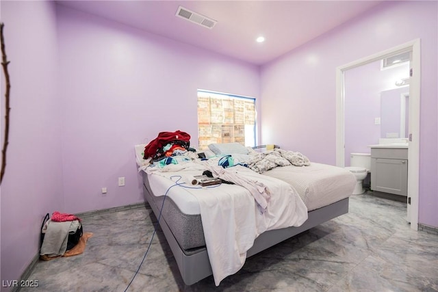 2807 Hermosa St, Las Vegas, NV 89169 - bedroom with baseboards, connected bathroom, and recessed lighting