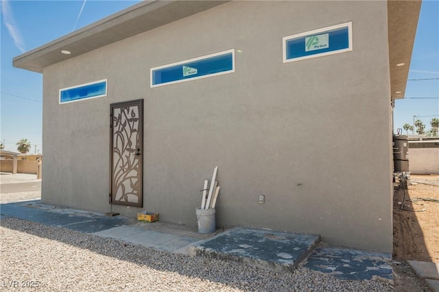 2807 Hermosa St, Las Vegas, NV 89169 - rear view of property featuring stucco siding