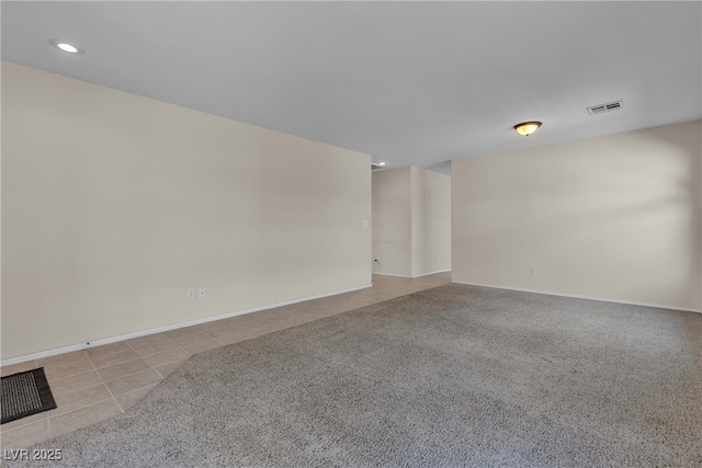 10791 Silver Lace Ln, Las Vegas, NV 89135 - spare room featuring recessed lighting, baseboards, light colored carpet, and light tile patterned floors