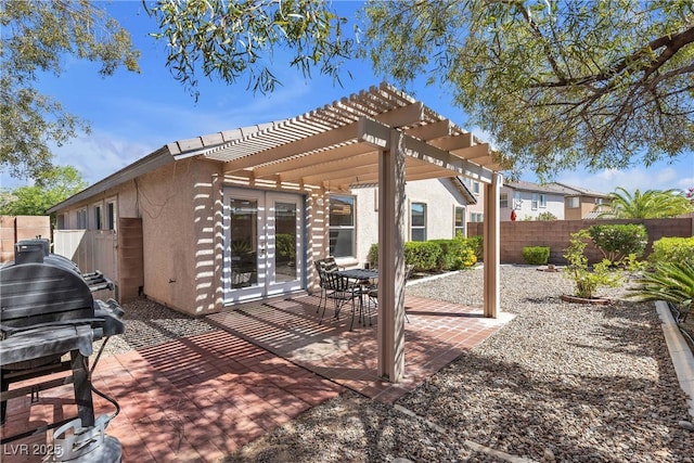 10791 Silver Lace Ln, Las Vegas, NV 89135 - fenced backyard featuring a pergola, a patio, and french doors