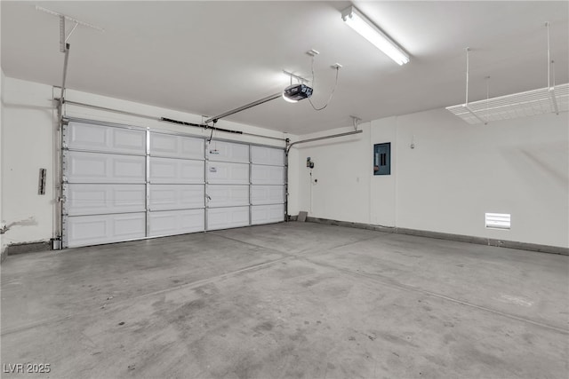 10791 Silver Lace Ln, Las Vegas, NV 89135 - garage featuring electric panel and a garage door opener