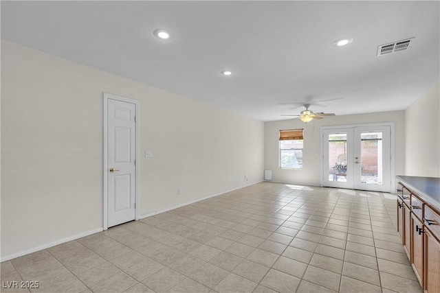 10791 Silver Lace Ln, Las Vegas, NV 89135 - spare room featuring french doors, a ceiling fan, recessed lighting, light tile patterned floors, and baseboards