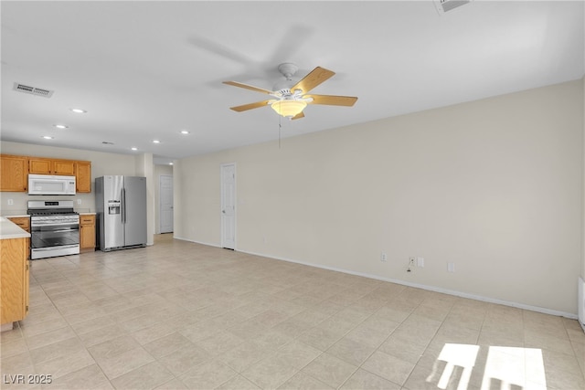 10791 Silver Lace Ln, Las Vegas, NV 89135 - unfurnished living room featuring recessed lighting, ceiling fan, and baseboards
