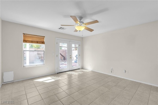 10791 Silver Lace Ln, Las Vegas, NV 89135 - unfurnished room featuring french doors, a ceiling fan, light tile patterned flooring, and baseboards