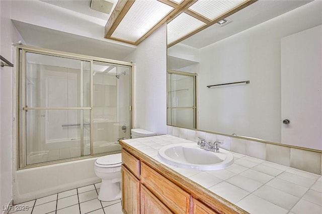 4083 Nook Way Unit D, Las Vegas, NV 89103 - full bathroom with toilet, tile patterned flooring, vanity, and shower / bath combination with glass door