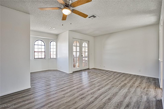 4083 Nook Way Unit D, Las Vegas, NV 89103 - unfurnished room with wood finished floors, ceiling fan, a textured ceiling, and baseboards