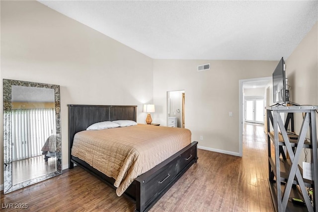 8932 Antioch Way, Las Vegas, NV 89117 - bedroom with vaulted ceiling, wood finished floors, and baseboards