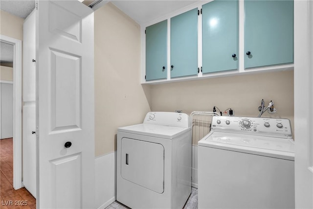 8932 Antioch Way, Las Vegas, NV 89117 - laundry area with cabinet space and washer and clothes dryer