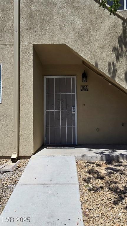 1832 N Decatur Blvd Unit 104, Las Vegas, NV 89108 - entrance to property with stucco siding