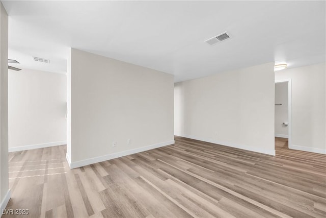 1832 N Decatur Blvd Unit 104, Las Vegas, NV 89108 - empty room with light wood-style flooring and baseboards