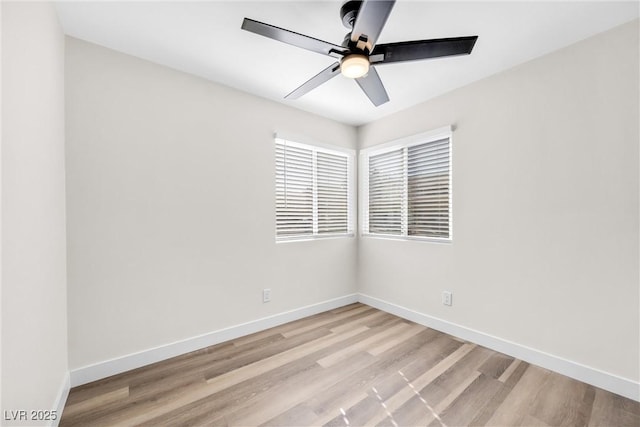1832 N Decatur Blvd Unit 104, Las Vegas, NV 89108 - empty room featuring baseboards, light wood-type flooring, and a ceiling fan