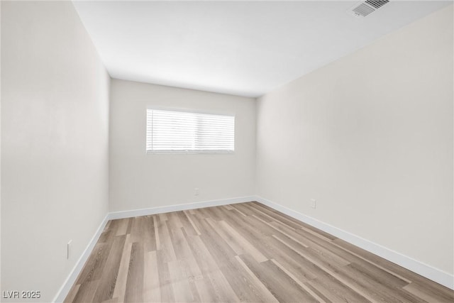 1832 N Decatur Blvd Unit 104, Las Vegas, NV 89108 - empty room with light wood-type flooring and baseboards