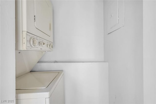 1832 N Decatur Blvd Unit 104, Las Vegas, NV 89108 - washroom featuring stacked washer and clothes dryer