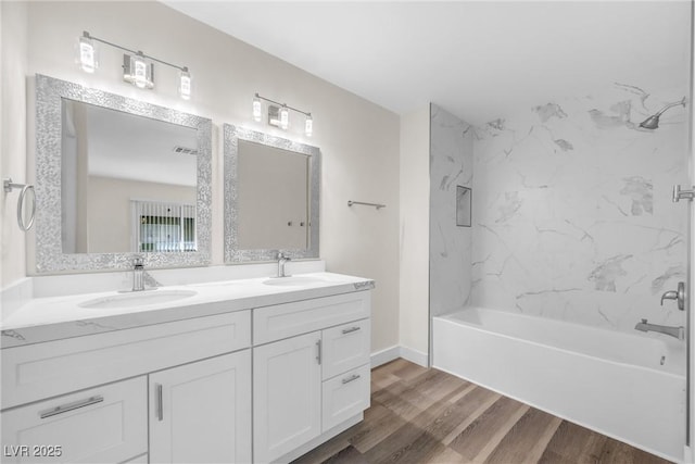 1832 N Decatur Blvd Unit 104, Las Vegas, NV 89108 - bathroom with wood finished floors, double vanity, and shower / bath combination