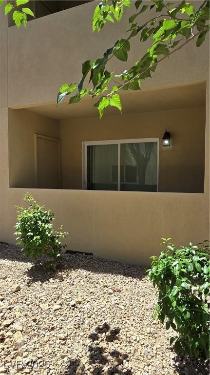 1832 N Decatur Blvd Unit 104, Las Vegas, NV 89108 - view of side of property featuring stucco siding