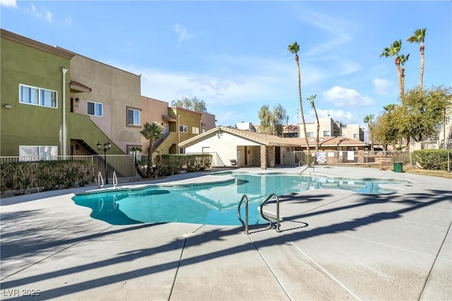 1832 N Decatur Blvd Unit 104, Las Vegas, NV 89108 - community pool featuring a residential view and a patio area