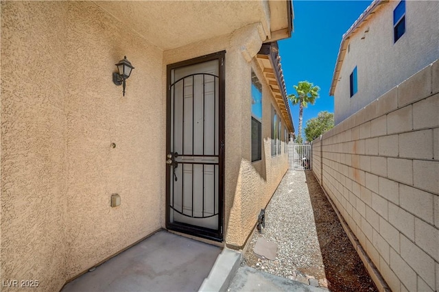 5548 Spearfish Lake Ct, Las Vegas, NV 89148 - entrance to property with stucco siding