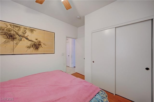5548 Spearfish Lake Ct, Las Vegas, NV 89148 - bedroom with a closet, ceiling fan, and light wood-style floors