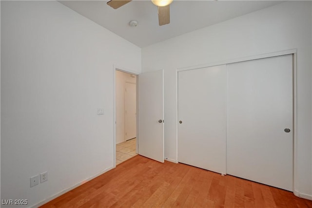 5548 Spearfish Lake Ct, Las Vegas, NV 89148 - unfurnished bedroom featuring light wood-type flooring, a closet, and ceiling fan