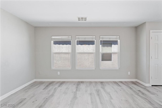 5116 Iron Crossing Ave, Las Vegas, NV 89131 - unfurnished room with light wood finished floors and baseboards