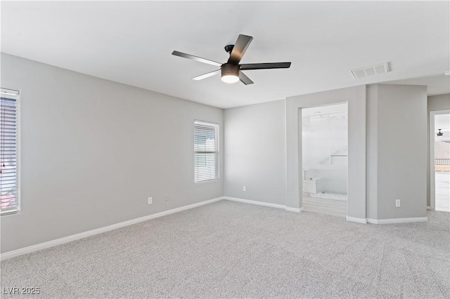 5116 Iron Crossing Ave, Las Vegas, NV 89131 - unfurnished bedroom featuring carpet flooring, ensuite bath, and baseboards