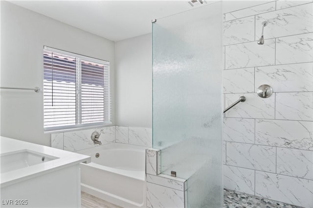 5116 Iron Crossing Ave, Las Vegas, NV 89131 - full bathroom featuring a stall shower, a garden tub, and a sink