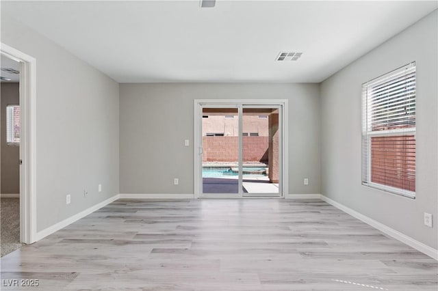 5116 Iron Crossing Ave, Las Vegas, NV 89131 - unfurnished room featuring light wood-style flooring and baseboards