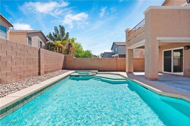 5116 Iron Crossing Ave, Las Vegas, NV 89131 - view of swimming pool with a fenced backyard, a patio area, and a pool with connected hot tub