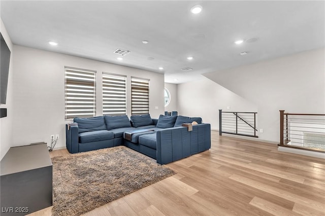 8076 Haywood Estate Ave, Las Vegas, NV 89113 - living area with light wood-type flooring and recessed lighting