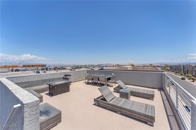 8076 Haywood Estate Ave, Las Vegas, NV 89113 - view of patio with a fire pit and outdoor dining area