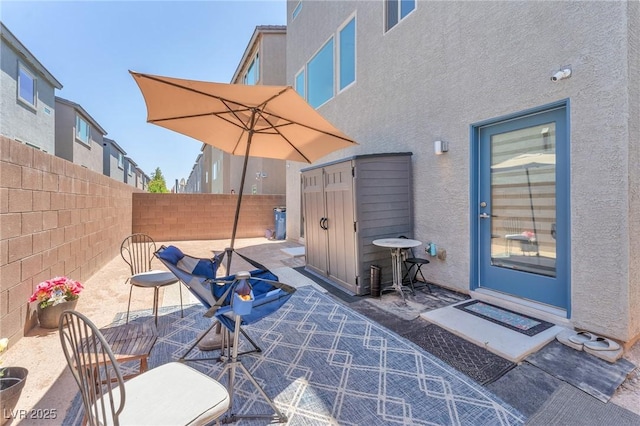 8076 Haywood Estate Ave, Las Vegas, NV 89113 - fenced backyard with a patio area