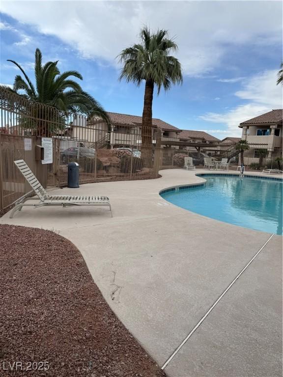 1320 Driscoll Dr Unit 202, Las Vegas, NV 89128 - community pool with a patio area