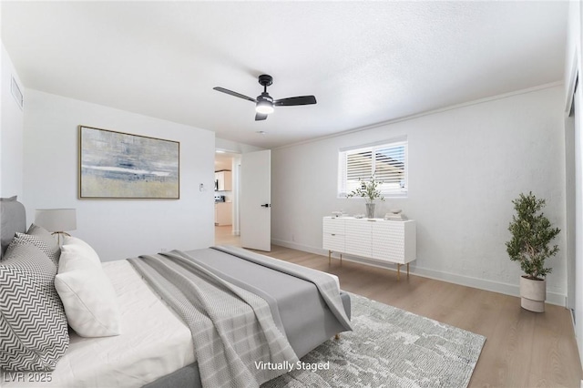 5069 Hallet Dr, Las Vegas, NV 89122 - bedroom featuring light wood-style floors, baseboards, and ceiling fan