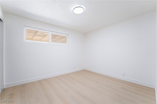 5069 Hallet Dr, Las Vegas, NV 89122 - unfurnished room featuring light wood-style flooring and baseboards