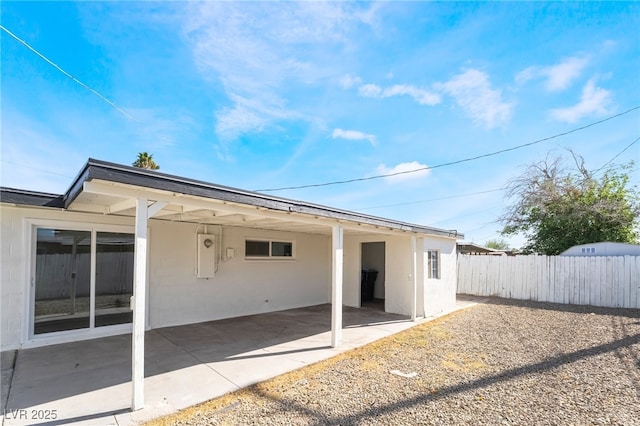5069 Hallet Dr, Las Vegas, NV 89122 - rear view of property with a patio area