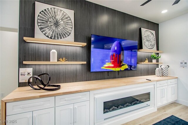 10025 Netherton Dr, Las Vegas, NV 89134 - detailed view of wood finished floors, a ceiling fan, and recessed lighting