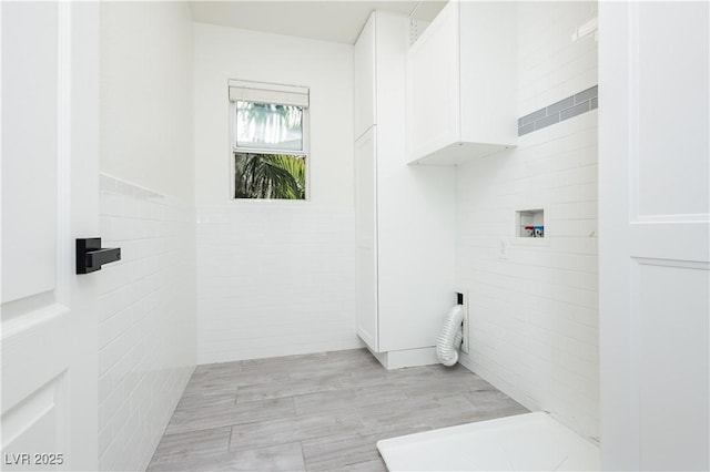 25 Blue Valley Dr, Henderson, NV 89002 - laundry room with cabinet space, washer hookup, and tile walls